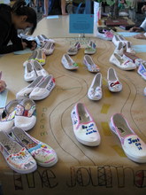 One Step at a Time: decorated pairs of shoes represent the progress made by students since starting at CSUN